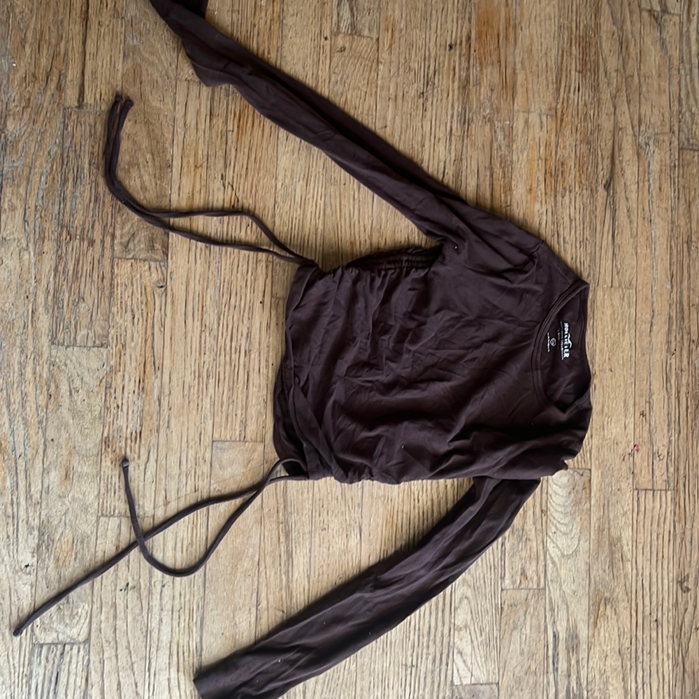 Brown long sleeved baby tee from hollister. from the "must-have collection"